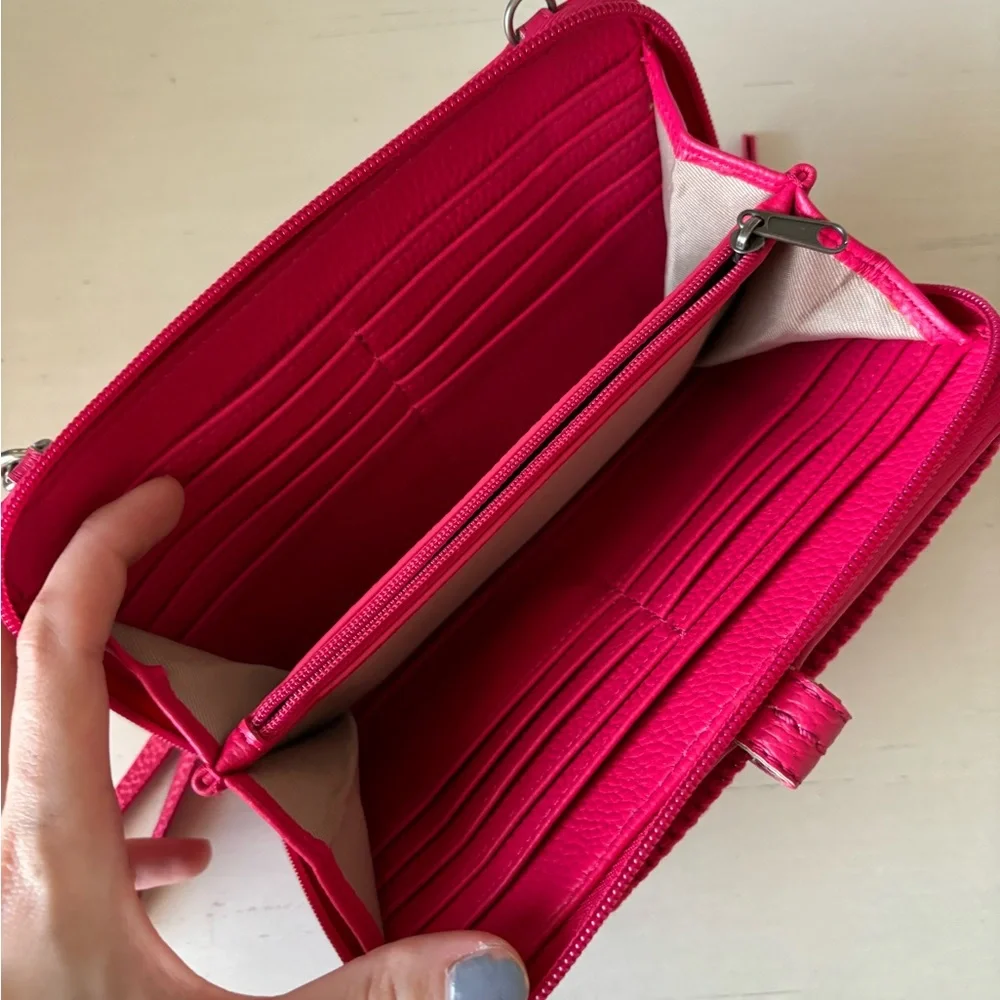 the Sak Iris Smartphone Wallet fuchsia pink